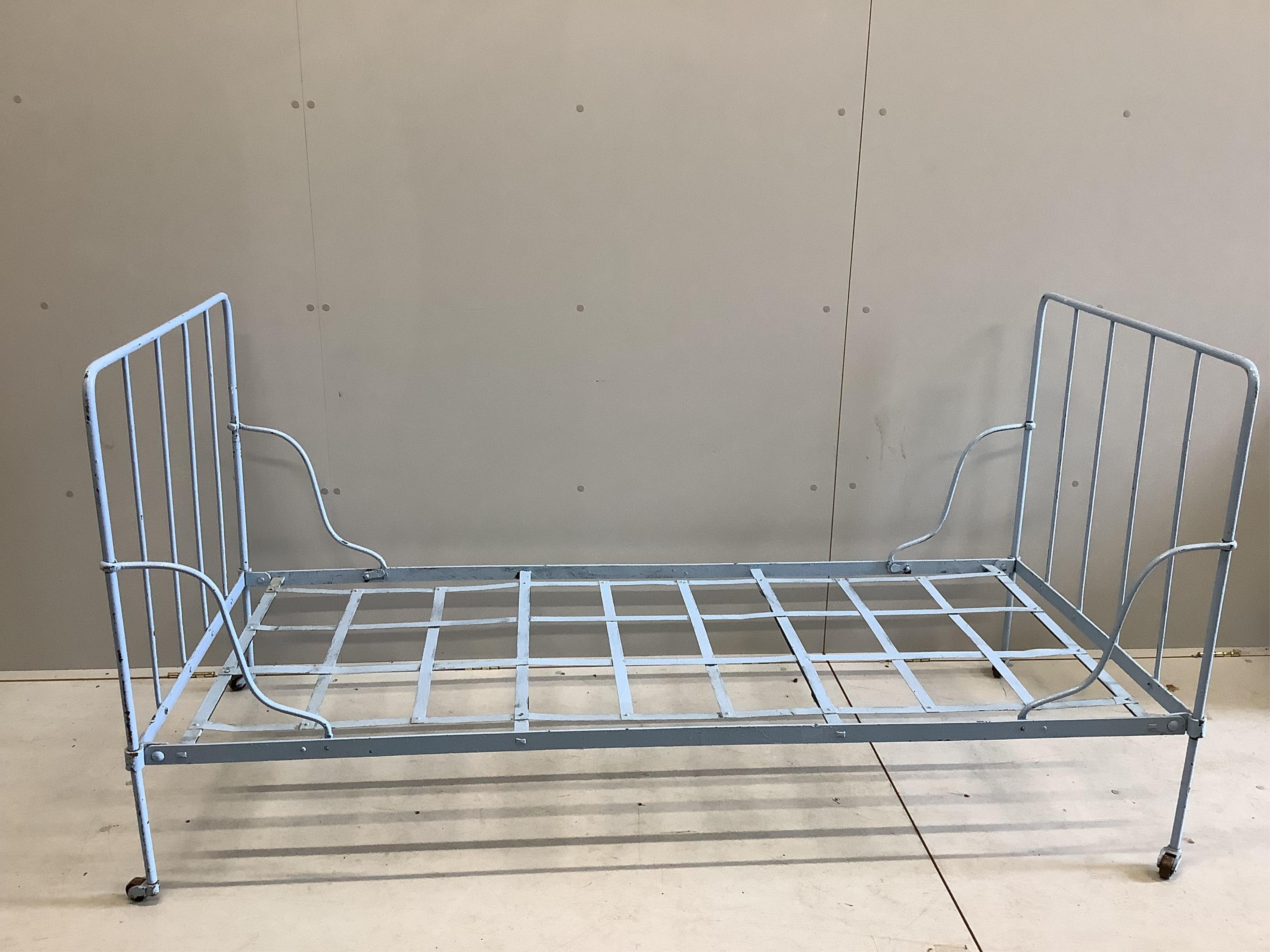 A late 19th century French wrought iron daybed, width 180cm, depth 81cm, height 92cm